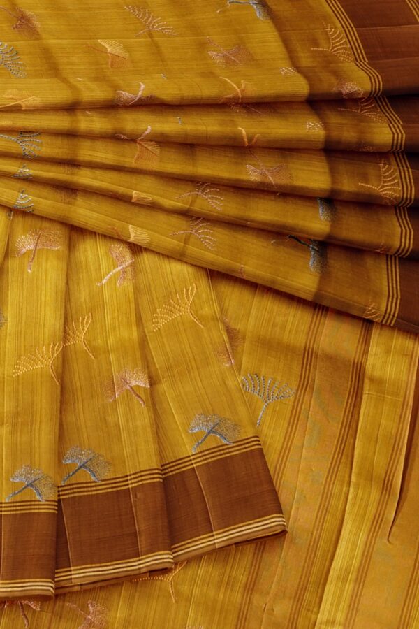 sri kumaran stores raw silk saree mustard color saree with thread work embroidery design 4