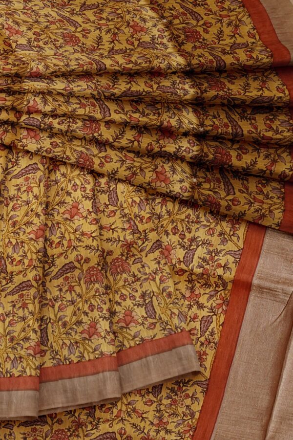 sri kumaran stores semi raw silk saree allover floral design egg nog color saree with golden and orange border 4