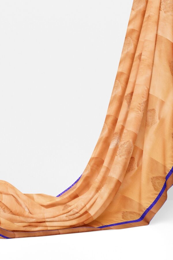 sri kumaran stores soft silk saree light apricot saree with ultramarine blue zari border and pallu 3