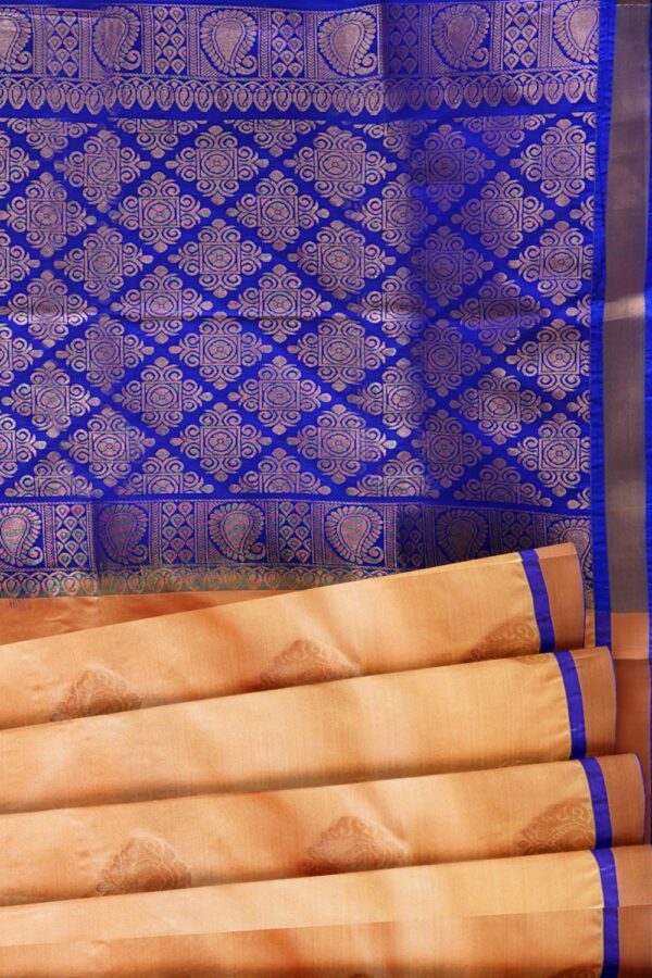 sri kumaran stores soft silk saree light apricot saree with ultramarine blue zari border and pallu 5