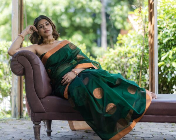 Sri kumaran stores instagram collection dark green saree with copper border 1