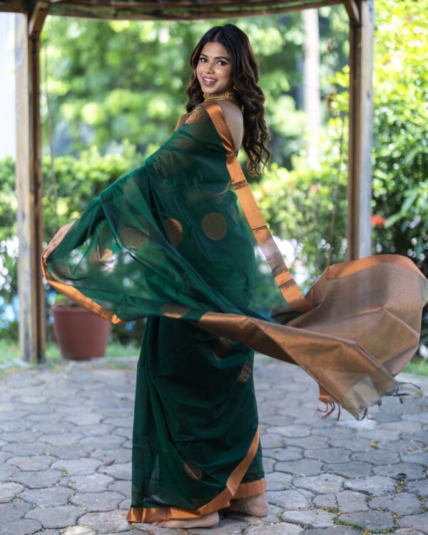 Sri kumaran stores instagram collection dark green saree with copper border 4