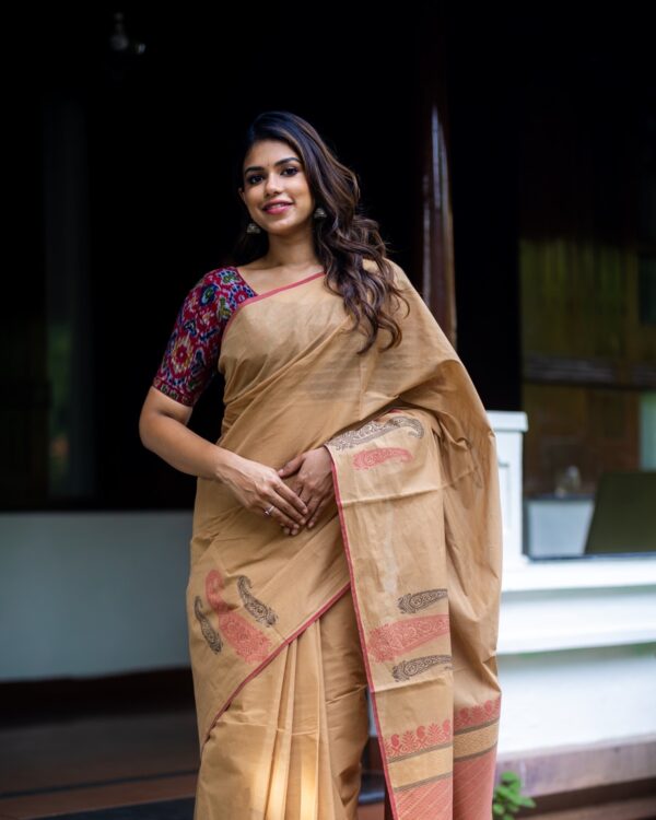 Sri kumaran stores instagram collection golden brown saree with red border 1