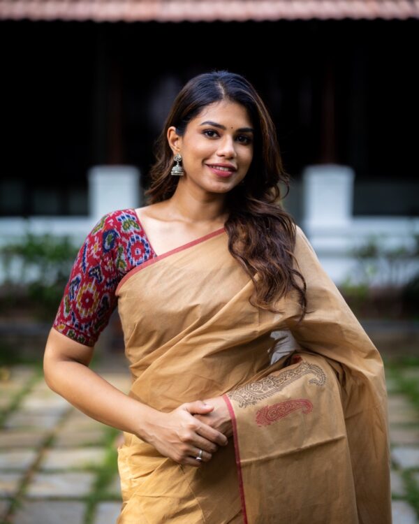 Sri kumaran stores instagram collection golden brown saree with red border 3