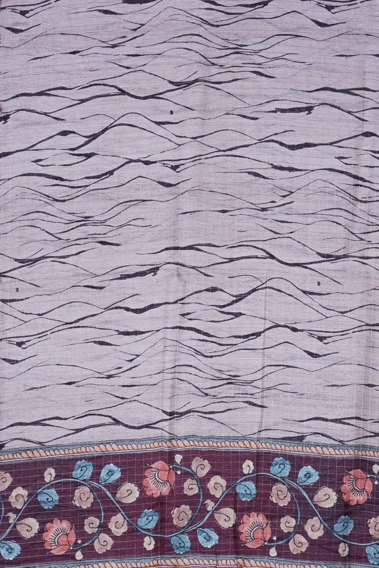 Mist grey semi tussar with wave lines and floral border.