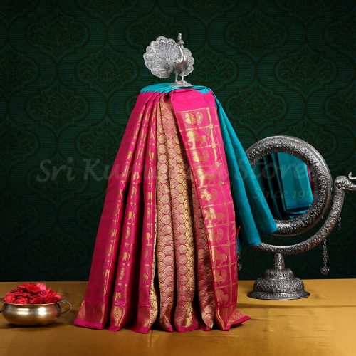 sri_kumaran_stores-kanchipuram_silks-blue_saree_with_red_border-1.jpg