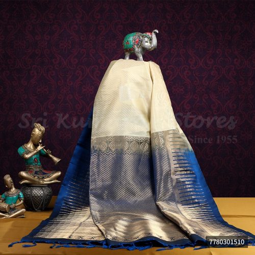 sri_kumaran_stores-kanchipuram_silks-white_saree_with_blue_border-1.jpg