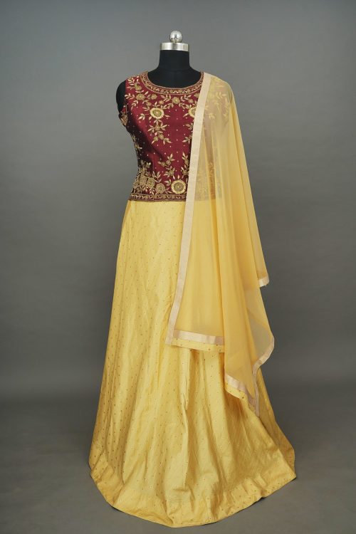 sri_kumaran_stores_lehenga_maroon_floral_top_with_yellow_bottom-1_9166e184-b1e4-43a3-a2be-197003b11e90.jpg
